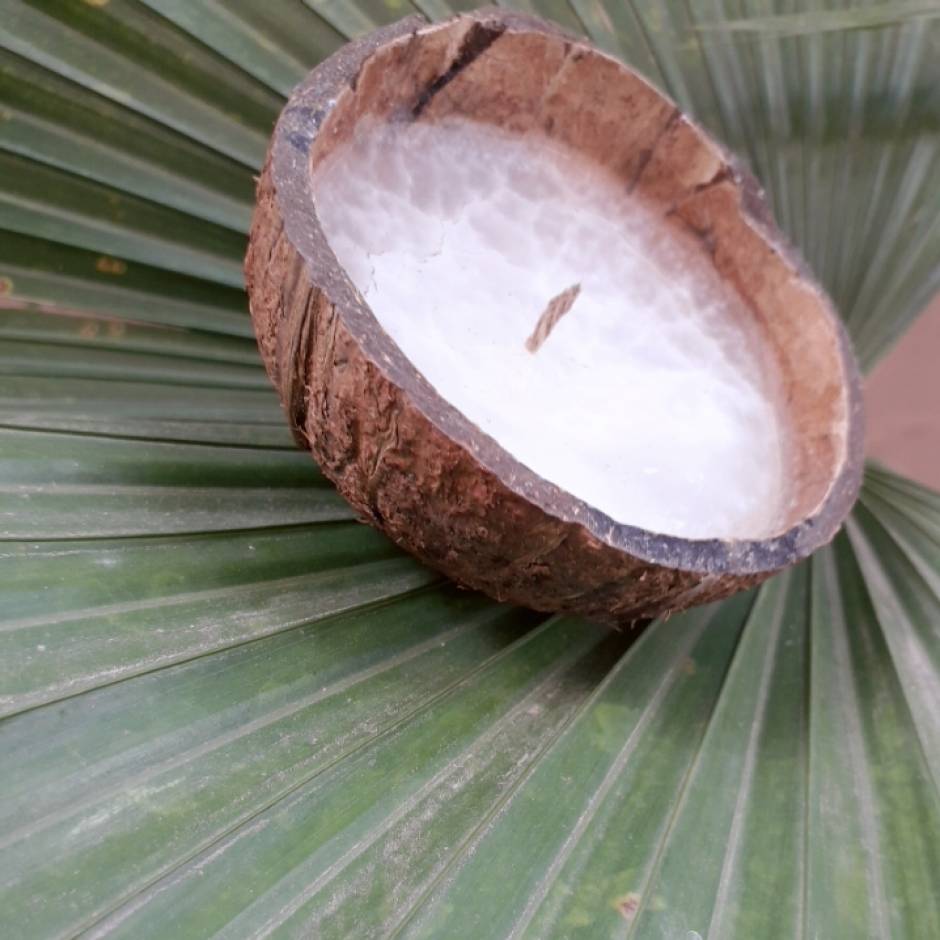 Candle made in coconut shell