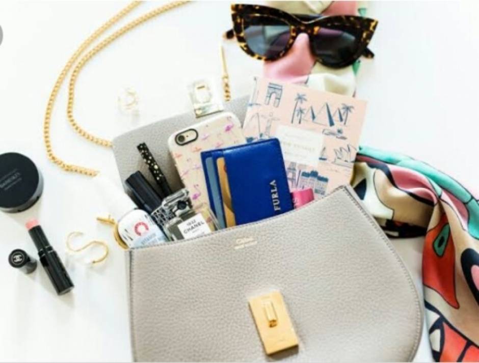 My Blog Essentials in her Handbag